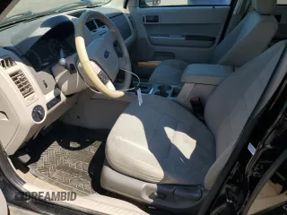 2010 Ford Escape Hybrid with VIN 1FMCU4K38AKC98072, listed as a Copart auction lot 58192375 with 123,958 mi miles and Salvage title. Bid and sale history available at DreamBid. Image 7.