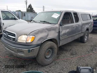 2000 Toyota Tundra SR5 with VIN 5TBRT3414YS086059, listed as a IAAI auction lot 41609962 with 105,030 mi miles and . Bid and sale history available at DreamBid. Image 2.