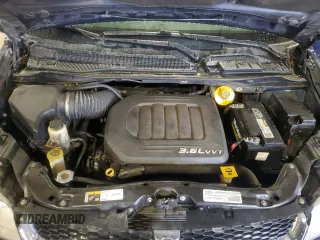2016 Dodge Grand Caravan SXT with VIN 2C4RDGCG6GR216884, listed as a Copart auction lot 46975405 with 241,750 mi miles and Salvage Title. Bid and sale history available at DreamBid. Image 12.