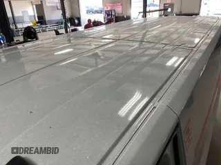 2020 Ford Transit Cargo with VIN 1FTBR1Y87LKA53852, listed as a IAAI auction lot 42300106 with 89,023 mi miles and . Bid and sale history available at DreamBid. Image 14.