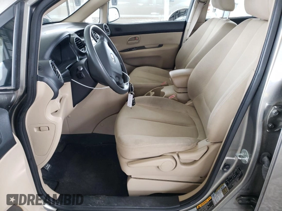 2009 Kia Rondo LX with VIN KNAFG526297252855, listed as a Copart auction lot 84956504 with 83,351 mi miles and Salvage Title. Bid and sale history available at carsss.com. Image 7.