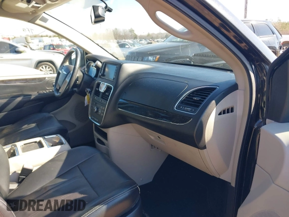 2015 Chrysler Town & Country Touring with VIN 2C4RC1BG9FR626501, listed as a IAAI auction lot 41279210 with 211,206 mi miles and . Bid and sale history available at DreamBid. Image 5.