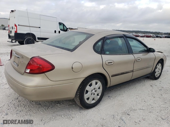 2001 Ford Taurus LX with VIN 1FAFP52U51A145880, listed as a Copart auction lot 77084934 with 54,143 mi miles and Salvage Title. Bid and sale history available at carsss.com. Image 3.