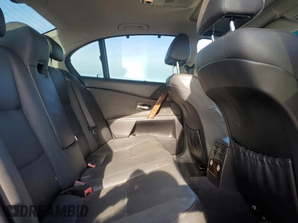 2005 BMW 5 Series 545i with VIN WBANB33565CN65980, listed as a Copart auction lot 52961975 with 143,772 mi miles and Salvage Title. Bid and sale history available at carsss.com. Image 10.