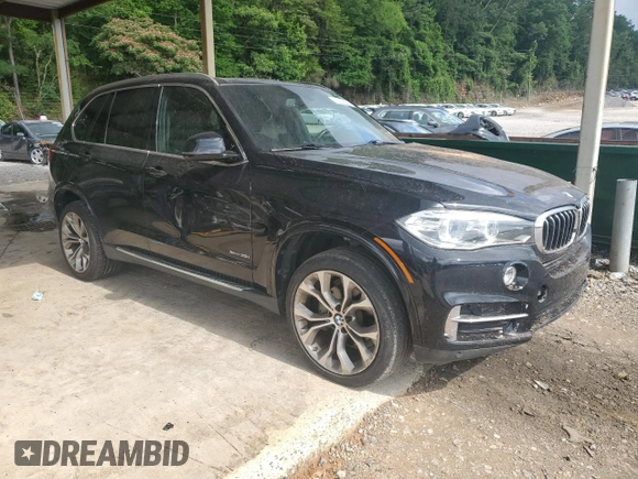 2017 BMW X5 xDrive35i z VIN 5UXKR0C50H0U53714, wystawiony jako Copart lot #57899365 z przebiegiem 124 846 mil mil oraz Szkoda całkowita • Salvage title. Historia ofert i sprzedaży dostępna na DreamBid. Obrazek 4.