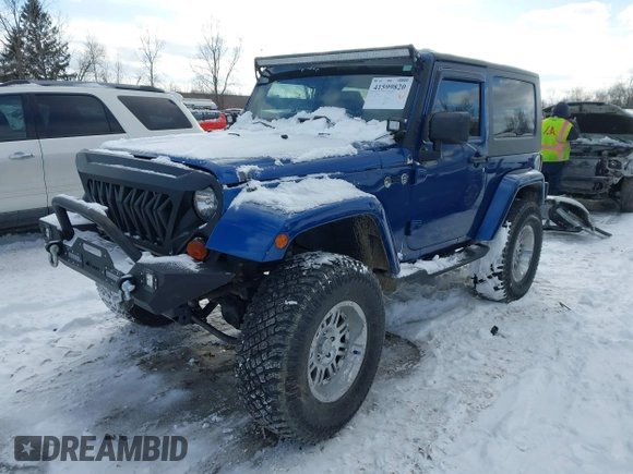 2010 Jeep Wrangler Sahara z VIN 1J4AA5D18AL170957, wystawiony jako IAAI lot #41599820 z przebiegiem 64 217 mil mil oraz . Historia ofert i sprzedaży dostępna na DreamBid. Obrazek 2.