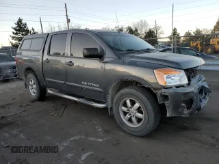 2012 Nissan Titan S with VIN 1N6AA0EC0CN325059, listed as a Copart auction lot 84828374 with 148,856 mi miles and Salvage Title. Bid and sale history available at carsss.com. Image 4.