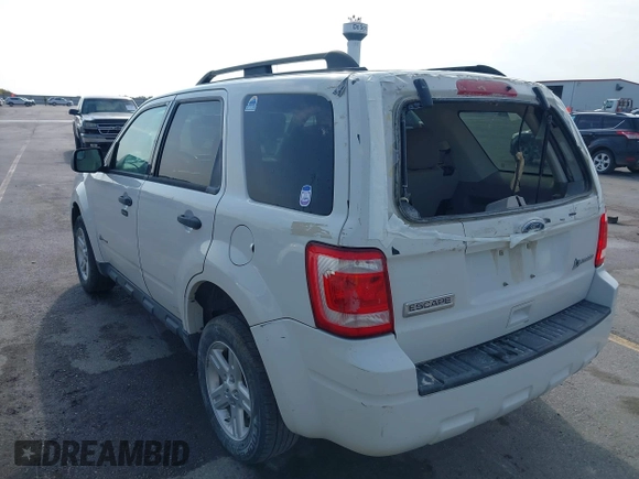 2010 Ford Escape Hybrid z VIN 1FMCU5K31AKD22069, wystawiony jako IAAI lot #40151027 z przebiegiem 185 932 mil mil oraz . Historia ofert i sprzedaży dostępna na DreamBid. Obrazek 3.