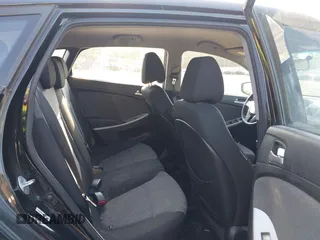 2013 Hyundai Accent GS with VIN KMHCT5AE7DU083576, listed as a IAAI auction lot 42693108 with 100,741 mi miles and . Bid and sale history available at DreamBid. Image 8.