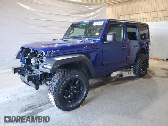 2020 Jeep Wrangler Unlimited Black and Tan with VIN 1C4HJXDG1LW267312, listed as a Copart auction lot 49658135 with 66,624 mi miles and Salvage title. Bid and sale history available at DreamBid. Image 1.