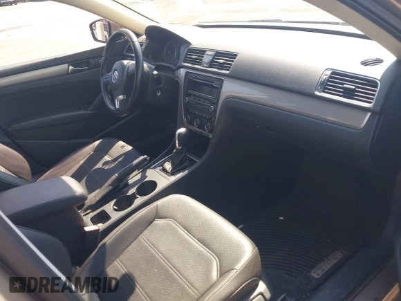 2015 Volkswagen Passat 1.8T Limited Edition with VIN 1VWAT7A34FC032404, listed as a IAAI auction lot 42126991 with 64,820 mi miles. Bid and sale history available at carsss.com. Image 5.