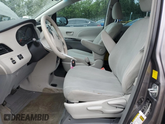 2011 Toyota Sienna with VIN 5TDZK3DC2BS114489, listed as a Copart auction lot 57773685 with 177,147 mi miles and Salvage title. Bid and sale history available at DreamBid. Image 7.