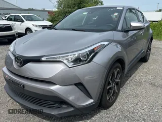 2018 Toyota C-HR XLE z VIN JTNKHMBX1J1008358, wystawiony jako Copart lot #58927015 z przebiegiem 157 018 mil mil oraz Tytuł czysty. Historia ofert i sprzedaży dostępna na DreamBid. Obrazek 2.
