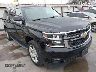 2016 Chevrolet Suburban LT with VIN 1GNSCHKC9GR410959, listed as a IAAI auction lot 41205381 with 114,036 mi miles. Bid and sale history available at carsss.com. Image 1.