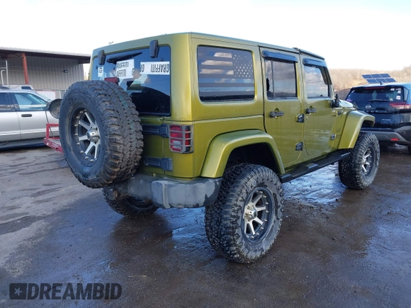 2007 Jeep Wrangler Unlimited Sahara with VIN 1J4GA59187L189519, listed as a IAAI auction lot 41204036 with 165,428 mi miles and . Bid and sale history available at DreamBid. Image 4.
