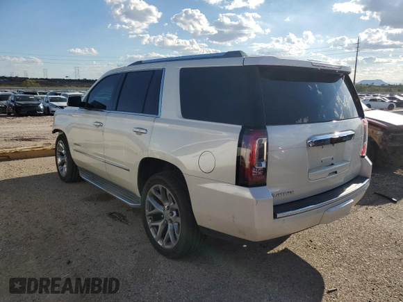 2015 GMC Yukon Denali with VIN 1GKS2CKJ0FR508598, listed as a Copart auction lot 71212924 with 133,220 mi miles and Salvage Title. Bid and sale history available at carsss.com. Image 2.