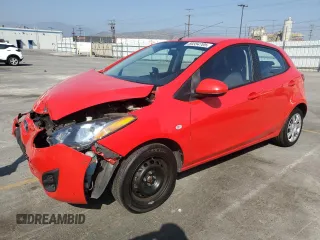 2014 Mazda 2 Sport z VIN JM1DE1KZ7E0186633, wystawiony jako Copart lot #59354705 z przebiegiem 111 234 mil mil oraz Szkoda całkowita • Salvage title. Historia ofert i sprzedaży dostępna na DreamBid. Obrazek 1.