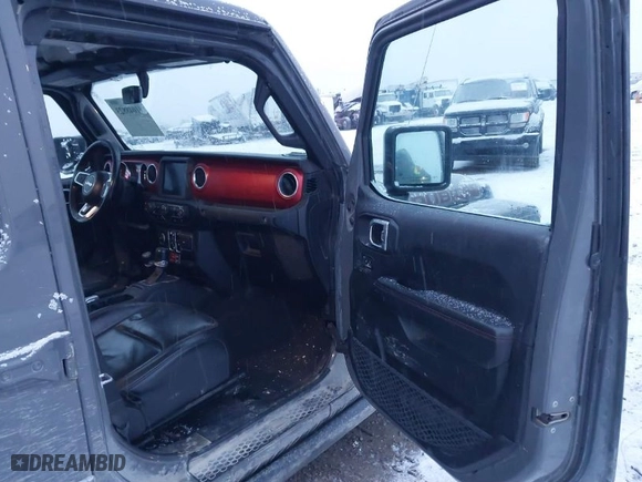 2020 Jeep Gladiator Rubicon with VIN 1C6JJTBG3LL146075, listed as a IAAI auction lot 41048823 with 130,318 mi miles. Bid and sale history available at carsss.com. Image 5.