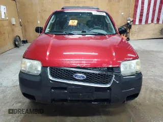 2003 Ford Escape XLT Popular 2 with VIN 1FMYU93103KB33975, listed as a Copart auction lot 70219724 with 182,037 mi miles and Clean Title. Bid and sale history available at carsss.com. Image 5.