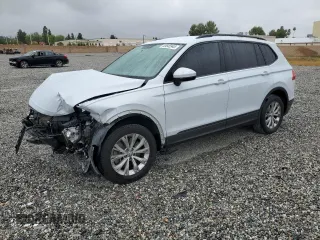 2018 Volkswagen Tiguan S with VIN 3VV1B7AXXJM067370, listed as a Copart auction lot 53645945 with 143,137 mi miles and Salvage title. Bid and sale history available at DreamBid. Image 1.