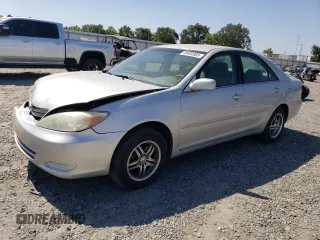 2002 Toyota Camry LE z VIN 4T1BE32KX2U037722, wystawiony jako Copart lot #58482805 z przebiegiem 154 207 mil mil oraz Szkoda całkowita • Salvage title. Historia ofert i sprzedaży dostępna na DreamBid. Obrazek 1.