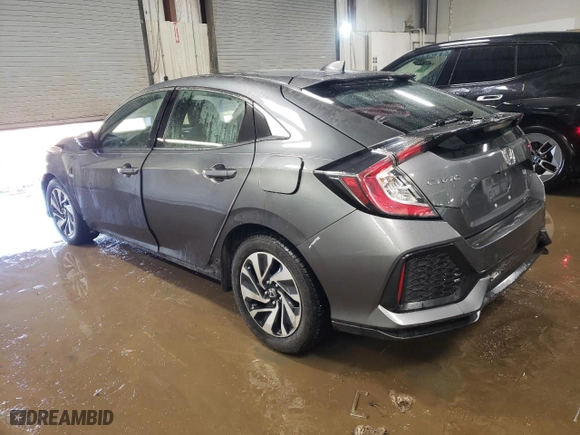 2018 Honda Civic Hatchback LX with VIN SHHFK7H21JU201345, listed as a Copart auction lot 48488325 with 59,384 mi miles and Salvage Title. Bid and sale history available at carsss.com. Image 2.