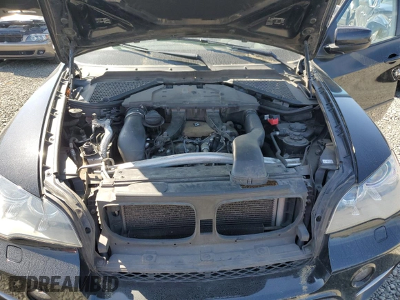 2012 BMW X5 35d with VIN 5UXZW0C54CL670228, listed as a Copart auction lot 53079785 with 144,905 mi miles and Clean title. Bid and sale history available at DreamBid. Image 12.