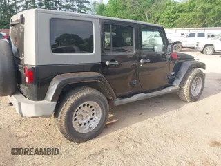 2008 Jeep Wrangler Unlimited Sahara with VIN 1J4GB591X8L523581, listed as a IAAI auction lot 42035446 with 200,570 mi miles and . Bid and sale history available at DreamBid. Image 4.