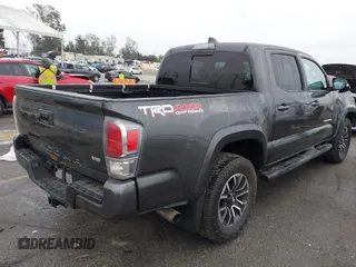 2020 Toyota Tacoma SR5 z VIN 3TMCZ5AN6LM323920, wystawiony jako IAAI lot #41885427 z przebiegiem 153 952 mil mil oraz . Historia ofert i sprzedaży dostępna na DreamBid. Obrazek 4.