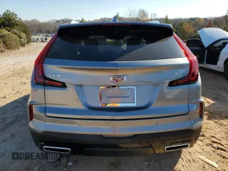 2025 Cadillac XT4 FWD Premium Luxury with VIN 1GYFZCR45SF115517, listed as a Copart auction lot 83263184 with 2,328 mi miles and Salvage title. Bid and sale history available at DreamBid. Image 6.