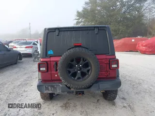 2021 Jeep Wrangler Unlimited Willys with VIN 1C4HJXDN6MW815448, listed as a IAAI auction lot 41459304 with 52,474 mi miles and . Bid and sale history available at DreamBid. Image 16.