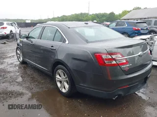 2018 Ford Taurus SEL z VIN 1FAHP2E85JG101221, wystawiony jako IAAI lot #42242127 z przebiegiem 123 787 mil mil oraz . Historia ofert i sprzedaży dostępna na DreamBid. Obrazek 3.