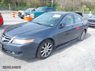 2006 Acura TSX with VIN JH4CL968X6C040128, listed as a IAAI auction lot 42054197 with 245,884 mi miles. Bid and sale history available at carsss.com. Image 2.