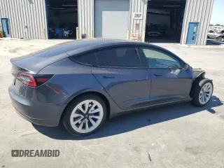 2023 Tesla Model 3 с VIN 5YJ3E1EA8PF512512, выставлен на аукционе Copart как лот 56300065 с пробегом 33 503 миль миль и Списание • Salvage title. История ставок и продаж доступна на DreamBid. Изображение 3.