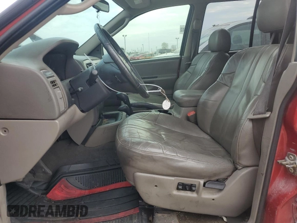 2003 Jeep Grand Cherokee Laredo z VIN 1J4GW48S73C523300, wystawiony jako Copart lot #73612503 z przebiegiem 109 570 mil mil oraz Nie do naprawy • Non repairable. Historia ofert i sprzedaży dostępna na DreamBid. Obrazek 7.