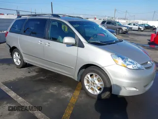 2006 Toyota Sienna XLE with VIN 5TDZA22C06S509177, listed as a IAAI auction lot 41033240 with 163,323 mi miles. Bid and sale history available at carsss.com. Image 1.