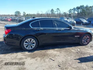 2011 BMW 7 Series 740i with VIN WBAKA4C58BC392020, listed as a IAAI auction lot 41314751 with 116,553 mi miles. Bid and sale history available at carsss.com. Image 13.
