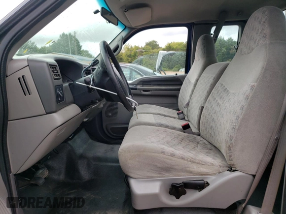 1999 Ford F-250 XL with VIN 1FTNX20L8XEB15501, listed as a Copart auction lot 70181124 with 125,476 mi miles and Salvage title. Bid and sale history available at DreamBid. Image 7.