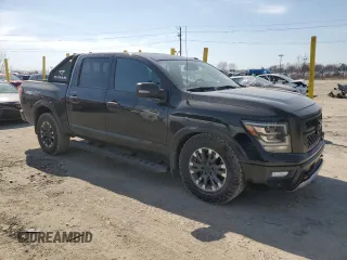 2020 Nissan Titan SL with VIN 1N6AA1ED1LN500028, listed as a Copart auction lot 48961155 with 50,088 mi miles and Salvage title. Bid and sale history available at DreamBid. Image 4.
