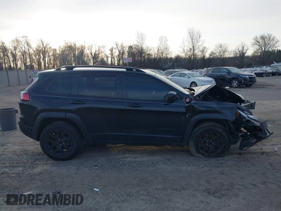 2022 Jeep Cherokee Trailhawk with VIN 1C4PJMBX0ND548397, listed as a IAAI auction lot 41240303 with 54,055 mi miles. Bid and sale history available at carsss.com. Image 13.