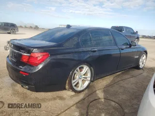 2015 BMW 7 Series 750Li xDrive z VIN WBAYF8C56FD654233, wystawiony jako Copart lot #83321604 z przebiegiem Nie podano mil oraz Nie do naprawy • Non repairable. Historia ofert i sprzedaży dostępna na DreamBid. Obrazek 3.