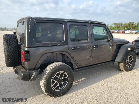 2024 Jeep Wrangler Rubicon with VIN 1C4PJXFG6RW261748, listed as a Copart auction lot 51479585 with 7,911 mi miles and Salvage Title. Bid and sale history available at carsss.com. Image 3.