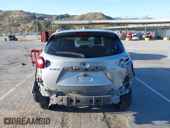 2016 Mazda CX-5 Grand Touring z VIN JM3KE2DY8G0709573, wystawiony jako IAAI lot #42021005 z przebiegiem 113 941 mil mil oraz . Historia ofert i sprzedaży dostępna na DreamBid. Obrazek 17.