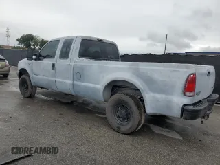 2000 Ford F-250 XL with VIN 1FTNX21F3YED35736, listed as a Copart auction lot 50309805 with 303,811 mi miles and Salvage title. Bid and sale history available at DreamBid. Image 2.
