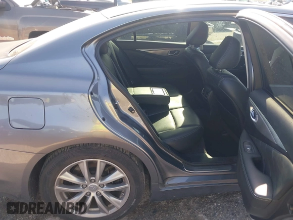 2014 Infiniti Q50 Hybrid Premium with VIN JN1AV7AP4EM691014, listed as a IAAI auction lot 41984130 with 114,230 mi miles and . Bid and sale history available at DreamBid. Image 8.