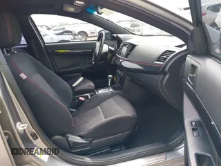 2017 Mitsubishi Lancer ES with VIN JA32U2FUXHU013182, listed as a IAAI auction lot 41894469 with 108,796 mi miles and . Bid and sale history available at carsss.com. Image 5.