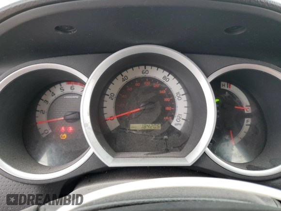 2012 Toyota Tacoma z VIN 3TMLU4EN6CM093217, wystawiony jako Copart lot #60237655 z przebiegiem 184 205 mil mil oraz Czysty tytuł • Clean title. Historia ofert i sprzedaży dostępna na DreamBid. Obrazek 9.