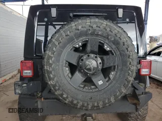 2013 Jeep Wrangler Unlimited Rubicon with VIN 1C4BJWFG5DL526884, listed as a Copart auction lot 47800225 with 112,207 mi miles and Salvage Title. Bid and sale history available at carsss.com. Image 6.