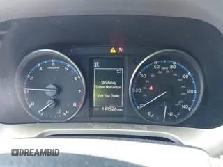 2018 Toyota RAV4 LE with VIN JTMZFREV4JJ734702, listed as a IAAI auction lot 41987540 with 141,526 mi miles. Bid and sale history available at carsss.com. Image 7.