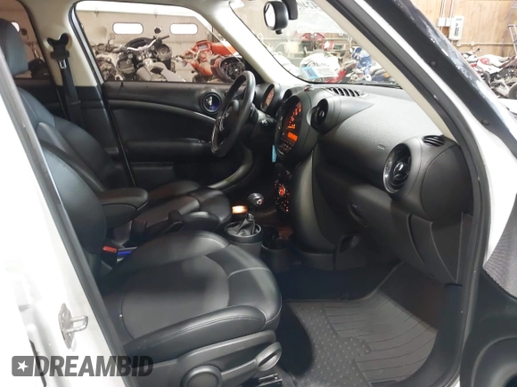 2016 MINI Countryman S with VIN WMWZC5C57GWU20085, listed as a IAAI auction lot 42403406 with 90,592 mi miles and . Bid and sale history available at DreamBid. Image 5.